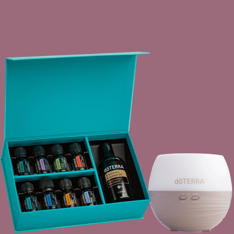 dōTERRA AromaTouch Diffused Kit including eight essential oils, Fractionated Coconut Oil and 12-hour diffuser displayed in teal presentation box